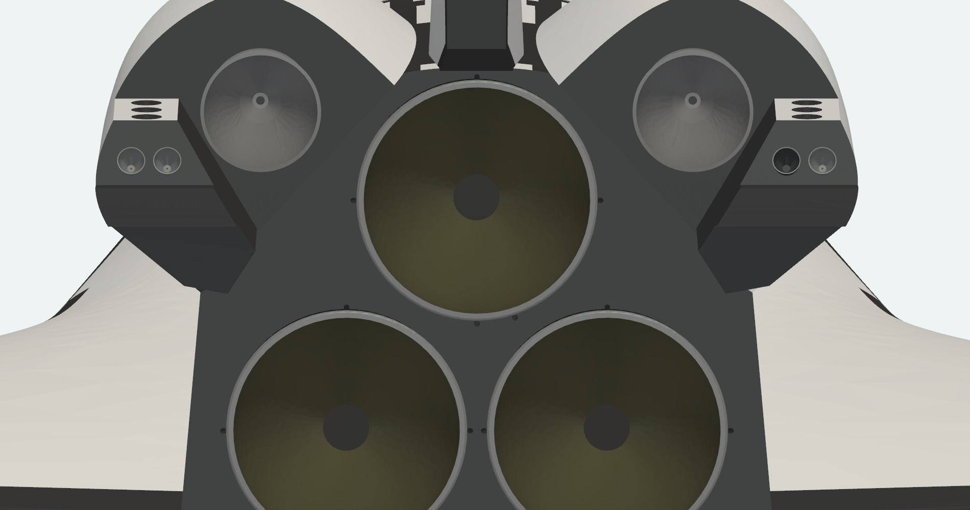 Close aft view of the three main-engine nozzle exits and the OMS pods